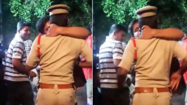 ఇదెక్కడి సరదారా నాయనా.. పోలీసుకే ముద్దు పెట్టాడు..! (వీడియో)