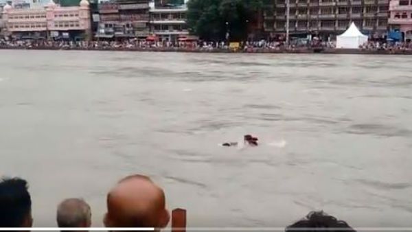 శభాష్ పోలీస్.. నదిలో కొట్టుకుపోతున్న వ్యక్తి సేఫ్..! (వీడియో)