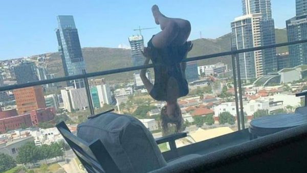 యోగా చేస్తూ..పట్టు తప్పి..80 అడుగుల ఎత్తు నుంచి కిందికి జారి!