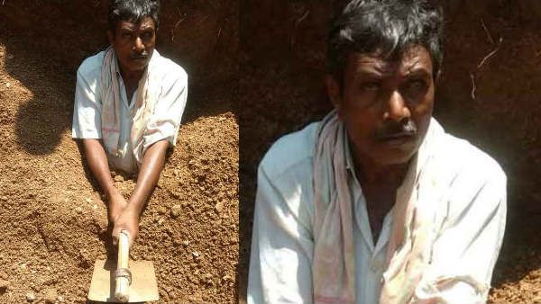 తనను తాను పాతిపెట్టుకుని ...పట్టా దారు పాసు బుక్ కోసం ఓ రైతు నిరసన ..