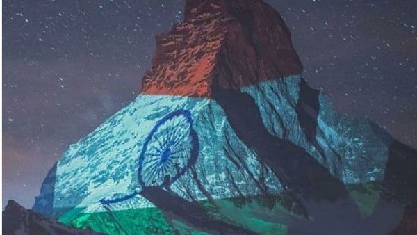 కరోనా పోరులో వెలుగు బావుటా: స్విస్ ఆల్ప్ప్ పర్వతాలపై మెరిసిన త్రివర్ణ పతాకం: ప్రపంచం..సలాం