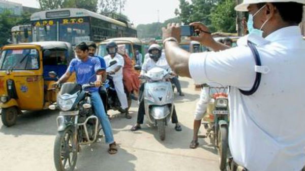 ఏపీలో వాహనదారులకు షాక్ ఇచ్చే రూల్స్ తో రవాణా శాఖ రెడీ ... హెల్మెట్ లేకున్నా బాదుడే