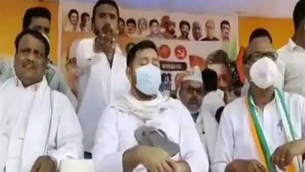 స్లిప్పర్ విసిరిన దుండగుడు: తేజస్వి ఒడిలో పడిన పాదరక్ష.. నో కామెంట్..