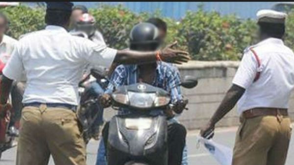 హెల్మెట్ పెట్టుకుంటారో లేకా లైసెన్స్ పోగొట్టుకుంటారో మీ ఇష్టం .. స్వీట్ వార్నింగ్