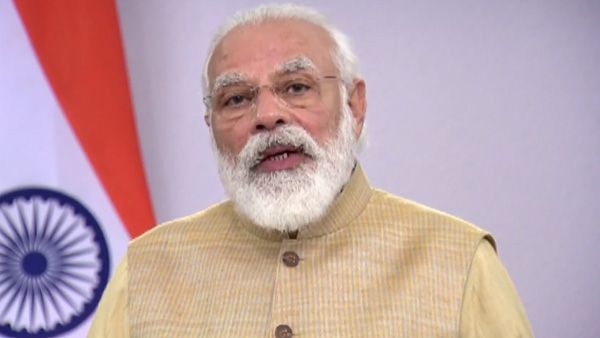 ఎన్నికలకు ముందు మోడీ తాయిలం .. అస్సాంలో ఇళ్ళ పట్టాల పంపిణీ చేసిన ప్రధాని