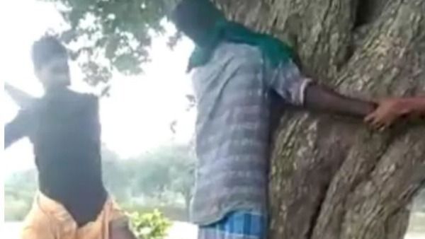 దారుణం : కళ్లకు గంతలు కట్టి.. చెట్టుకు కట్టేసి కర్రలతో దళితుడిపై విచక్షణారహితంగా దాడి