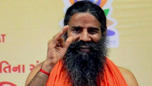 పతంజలి కరోనిల్ కరోనా సహాయక మెడిసిన్ గా ప్రకటించిన యోగా గురు రాందేవ్ బాబా