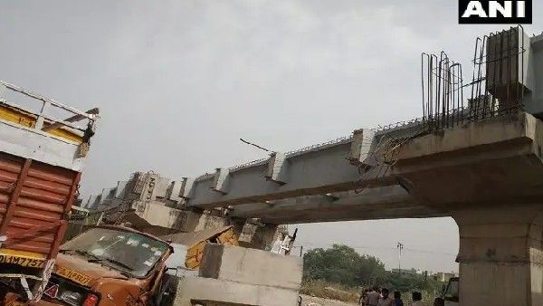 షాకింగ్: కుప్పకూలిన బ్రిడ్జి - శిథిలాల్లో చిక్కుకున్న కార్మికుడు -ఢిల్లీలోని పంజాబీ బాగ్‌లో ఘటన