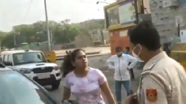 నా భర్తను ముద్దు పెట్టుకుంటా.. ఆపుతావా .. కరోనా రూల్స్ పాటించకుండా ఢిల్లీలో ఓ జంట హంగామా !!