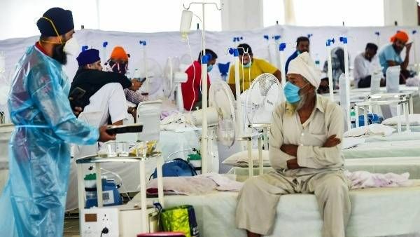 కరోనాను దూరం పెట్టాలంటే.: నోటి తుంపర్లతో జాగ్రత్త, 10 మీటర్ల వరకు, వెంటిలేషనే కీలకం, ఫ్యాన్లే బెస్ట్