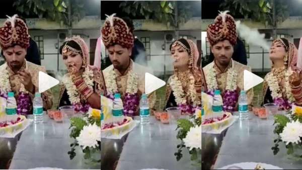 హవ్వా.. పెళ్లి కొడుకు పక్కనే... స్మోక్ చేస్తూ.. రింగులు ఊదుతూ.. ఇదీ నయా ట్రెండ్..