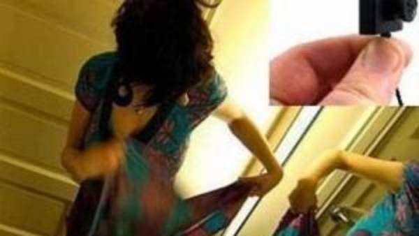 నీచుడా.. ఏం పని.. బట్టలు మార్చుకుంటుండగా.. వీడియో తీసి