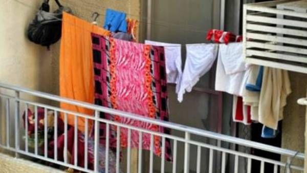 అక్కడ బాల్కనీలో బట్టలు ఆరేస్తే నేరం..20 వేల రూపాయల ఫైన్