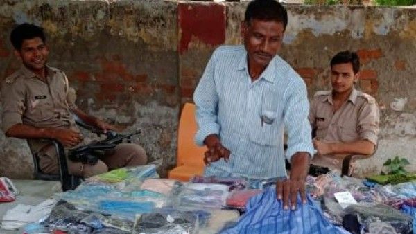 తోపుడు బండి వ్యాపారికి ఇద్దరు బాడీగార్డులు... AK-47తో సెక్యూరిటీ