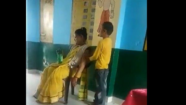 స్కూల్లో విద్యార్థితో మసాజ్ చేయించుకున్న టీచర్.. వీడియో వైరల్; టీచర్ పై సస్పెన్షన్ వేటు!!