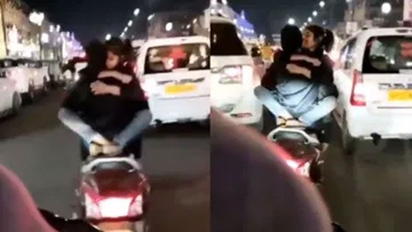 Lovers: రద్దీరోడ్డులో స్కూటీలో లవర్స్ లిప్ లాక్, రొమాన్స్, హీరో హీరోయిన్ కోసం?, సీసీటీవీల్లో (వీడియో)!