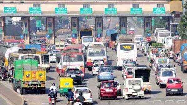 దేశంలో మొదలైన కొత్త టోల్ బాదుడు; వాహనదారుల జేబులకు చిల్లు!!