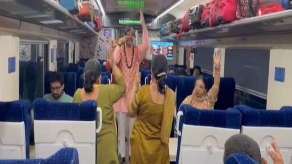 వేగంగా వెలుతున్న వందే భారత్ రైలులో యోగా చేసిన ప్రయాణికులు, ఎలా !