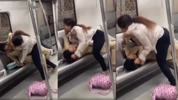 మెట్రోలో పొట్టు పొట్టు కొట్టుకున్నారు.. వీడియో వైరల్