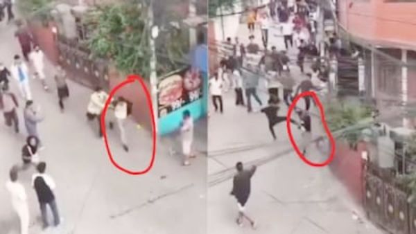 వైరల్ వీడియో: ఆర్థిక మంత్రిని పరిగెత్తించి పొట్టు పొట్టు కొట్టారు