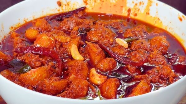 ఉసిరికాయ ఆవ నిల్వ పచ్చడి ఇలా చేస్తే అద్భుతం.. తింటే మీకు ఆరోగ్యం!