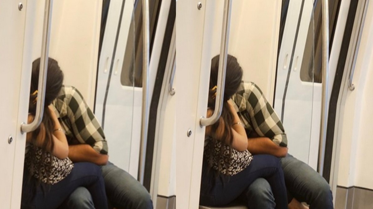  Couple kissing in Delhi metro