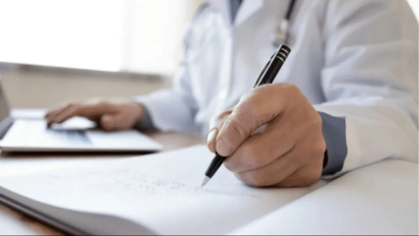 Doctor hand writing