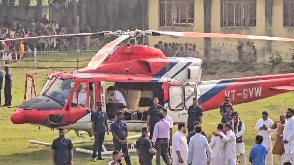 Rahul Gandhi waits as his helicopter
