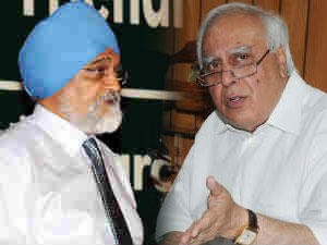 Planning Commission deputy chairperson Montek Singh and HRD minister Kapil Sibal Planning Commission deputy chairperson Montek Singh and HRD minister Kapil Sibal