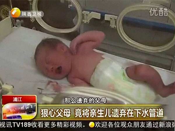 Newborn Baby Rescued from Toilet Pipe in China. Newborn Baby Rescued from Toilet Pipe in China.
