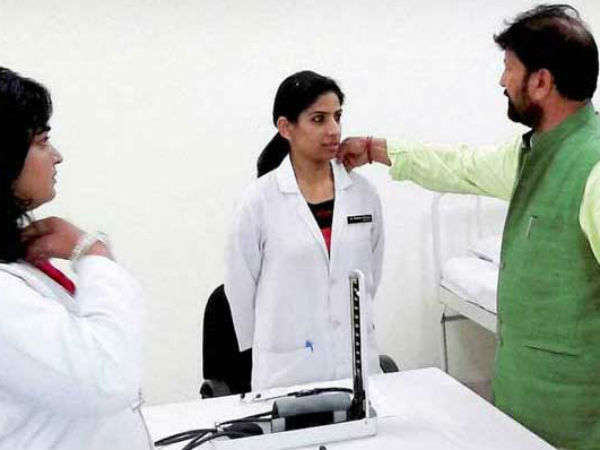 Jammu and Kashmir Minister 'Fixes' Woman Doctor's Collar, Image Goes Viral Jammu and Kashmir Minister 'Fixes' Woman Doctor's Collar, Image Goes Viral