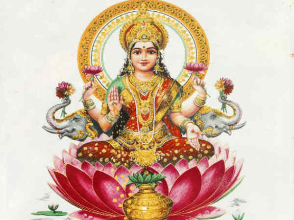 पर्स में रखें लक्ष्मी जी को फोटो