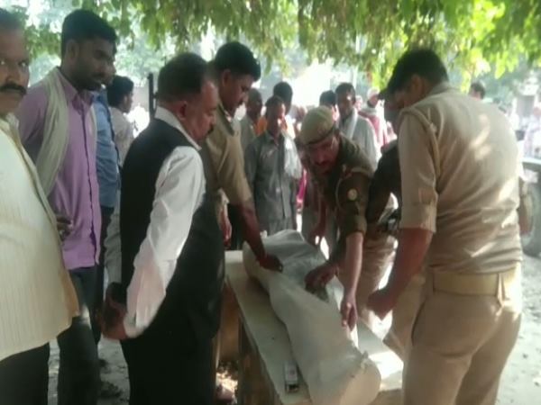 मंदिर के पीछे मिली लाश