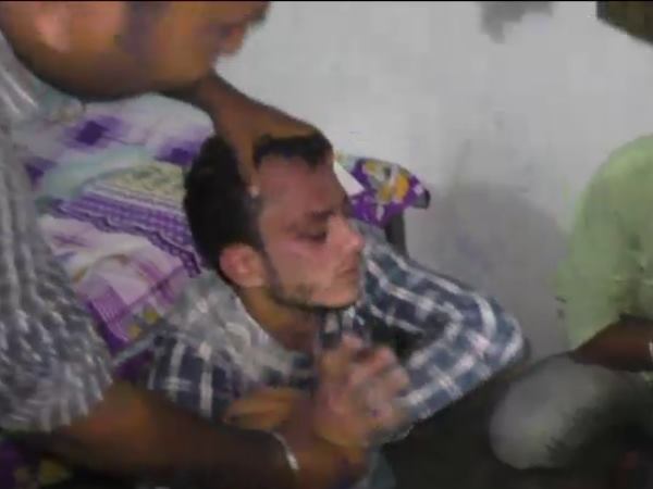 Two youth beaten by police and public for molesting a girl in Hapur, Uttar Pradesh.