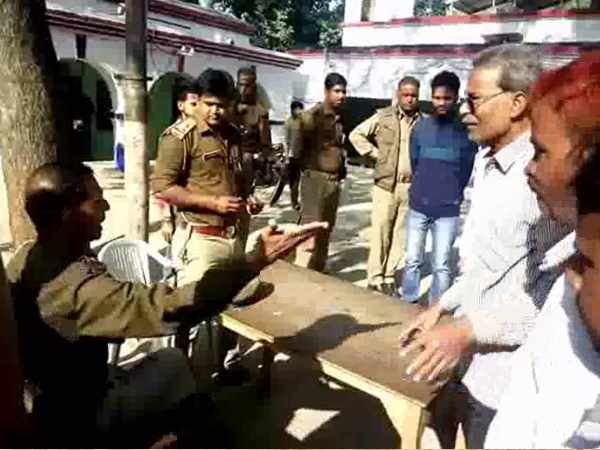 two parties beating with aarti in the temple in Kannauj two parties beating with aarti in the temple in Kannauj