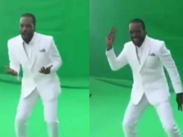 गेल ने इस वीडियो में सफेद रंग का सूट पहने हुए हैं