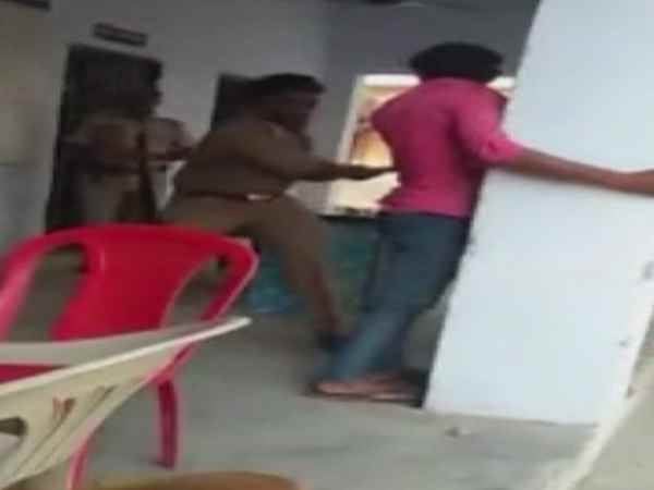 Sub Inspector beating up a rape accused with belt surfaces