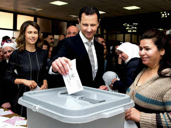 पत्‍नी सुन्‍नी समुदाय की और असद अलावाइत