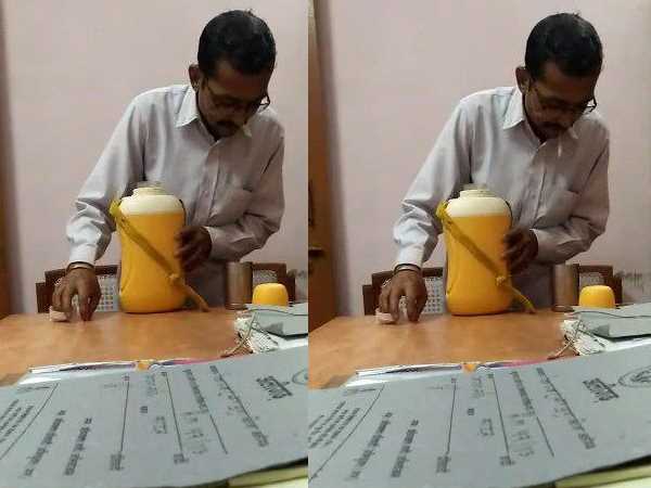 Peon spits in glass and serving water two judicial officer viral video Peon spits in glass and serving water two judicial officer viral video