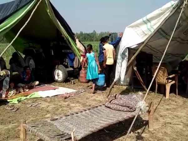 Families living in field after tension on loudspeaker in Bijnor