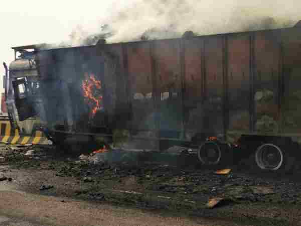 Photos of truck burning on highway in Allahabad