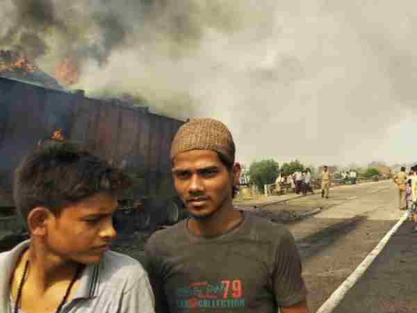Photos of truck burning on highway in Allahabad