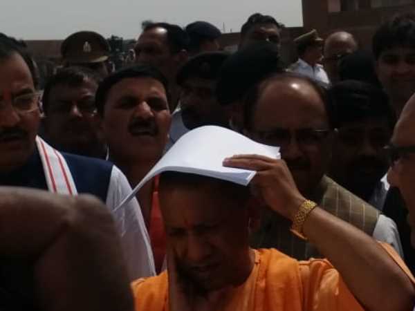 CM Yogi Adityanath suffers in heat of sun in Allahabad 