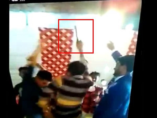 agra men dance with illegal wepon just near to police station. agra men dance with illegal wepon just near to police station.