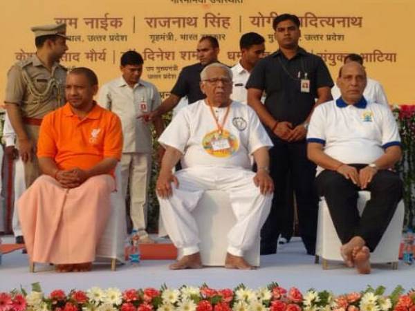 yoga day CM yogi seen in bhagwa t-shirt during yoga day yoga day CM yogi seen in bhagwa t-shirt during yoga day