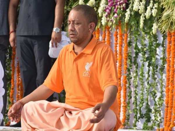 yoga day CM yogi seen in bhagwa t-shirt during yoga day yoga day CM yogi seen in bhagwa t-shirt during yoga day