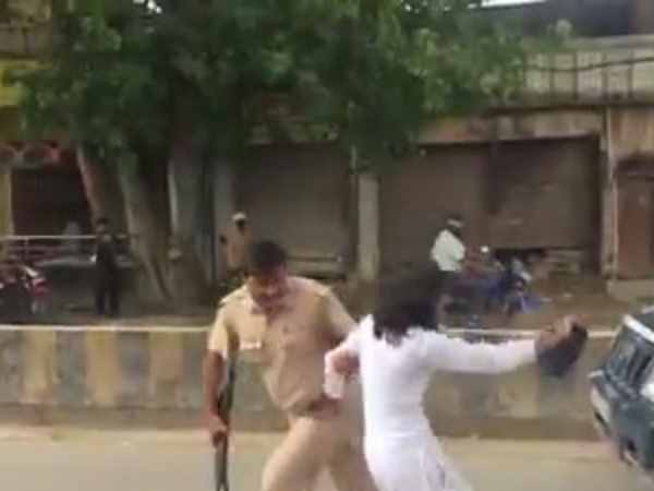 Amit Shah has two girls showing black flags in Allahabad Amit Shah has two girls showing black flags in Allahabad