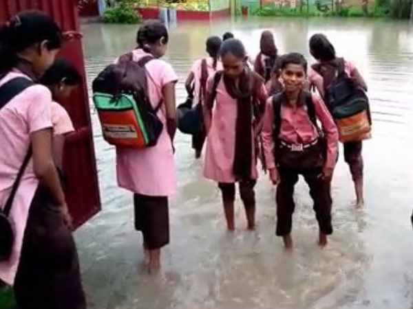 school flooded with water due to heavy rain in etawah