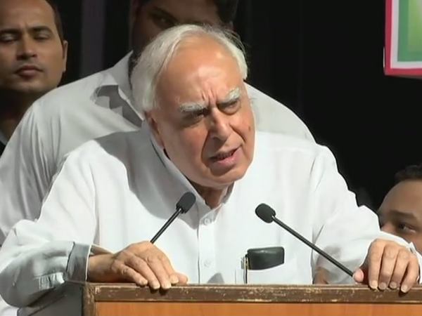 Kapil Sibal over rahul gandhi hug narendra modi in parliament Kapil Sibal over rahul gandhi hug narendra modi in parliament