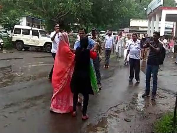 mother in law and wife beaten man in front of dm office, watch viral video mother in law and wife beaten man in front of dm office, watch viral video